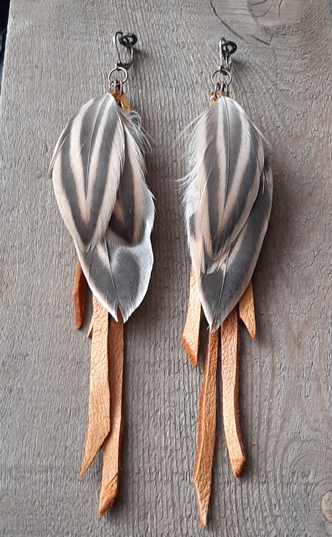 Natural Pheasant feather earrings with buckskin leather