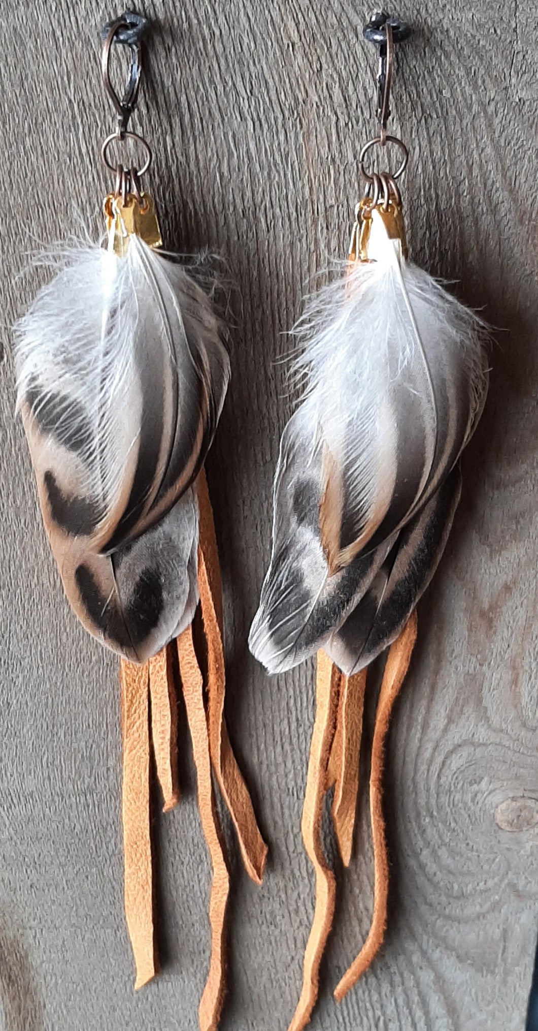 Natural Pheasant feather earrings with buckskin leather